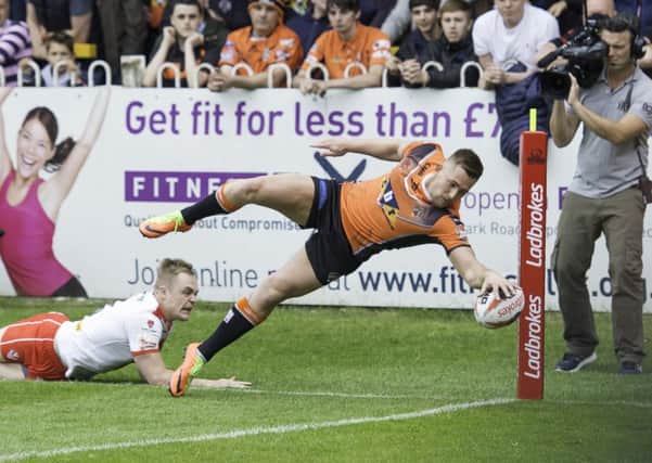 OVER THE LINE: Castleford's Greg Eden, scoring a try against St Helens in May this year. Picture by Allan McKenzie/SWpix.com