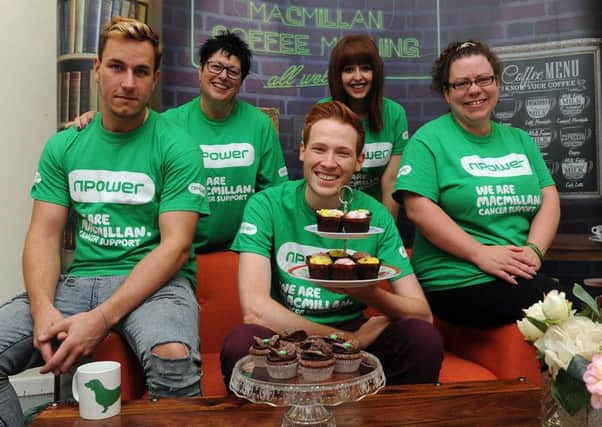 Great British Bake Off 2016 finalist Andrew Smyth joins Leeds npower staff  as they support Macmillan's World's Biggest Coffee Morning. Picture Scott Merrylees