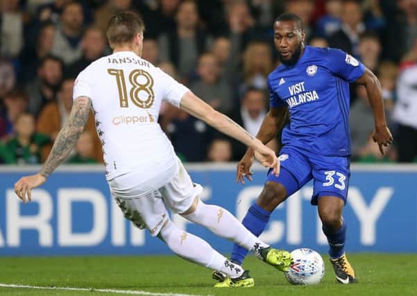 Cardiff City's Junior Hoilett and Pontus Jansson battle for the ball. PIC: PA