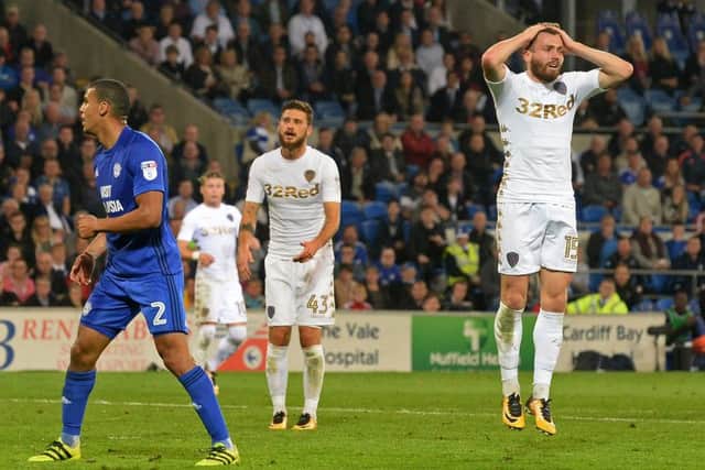 CHANGES: Stuart Dallas, right, and Mateusz Klich, centre, were both handed starts for Leeds United at Cardiff City but the Whites crumbled to a 3-1 defeat. Picture by Bruce Rollinson.