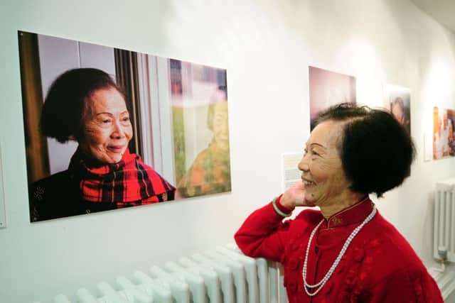 Leung Ip is pictured with her portrait
Picture by Simon Hulme