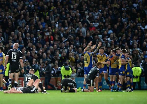 Winners and losers - Hull FC and Leeds Rhinos players at the end of their epic semi-final
