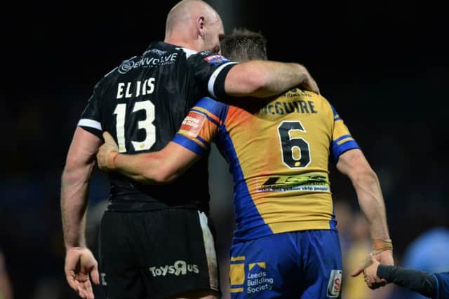 Garteh Ellis and Danny McGuire embrace at full time.