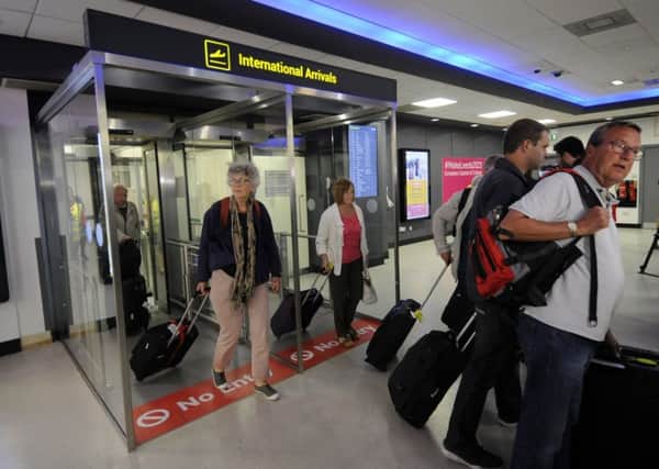 Monarch passengers arrive at Leeds Bradford Airport after a repatriation flight from Dalaman Mugla. Pictures: Simon Hulme