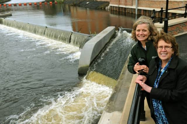 041017    Emma  Howard Boyd Chairman of the Environment Agency  (left) and Cllr Judith Blake L, eader of Leeds City Council who jointly  opened  of the first phase of the Leeds Flood Alleviation scheme near to the Royal Armouries,   yesterday(wed).