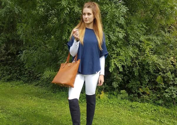 Cove round neck poncho, Â£110, with Amira boots, and Fairfax & Favor Hurlingham Tote Bag, Â£335.