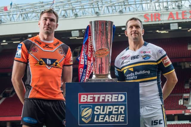 Castleford Tigers' Michael Shenton & Leeds Rhinos' Danny McGuire with the Betfred Super League Trophy.