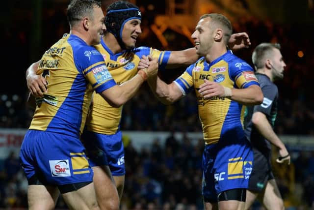 Danny McGuire with Ashton Golding and Rob Burrow.
