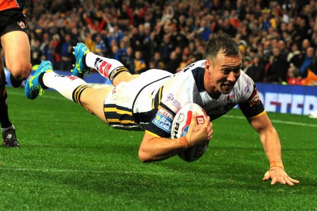 Danny McGuire dives in for Leeds Rhinos' second try at Old Trafford.