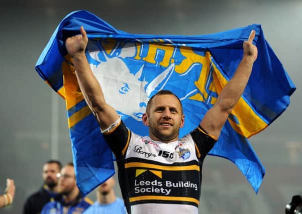 Rob Burrow salutes the Rhinos fans.
 PIC: Bruce Rollinson