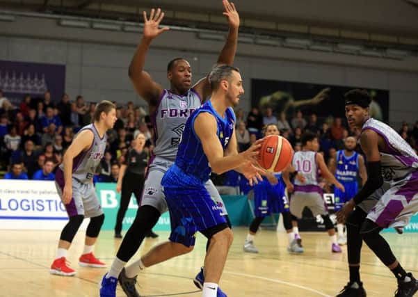 Sheffield Sharks player Mike Tuck lining one up on the basket. Picture: Chris Etchells
