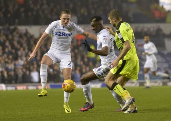Hadi Sacko and Luke Ayling, left, battle with Reading's Joey Van Den Berg during last year's encounter at Elland Road which the hosts won 2-0. Picture: Bruce Rollinson
