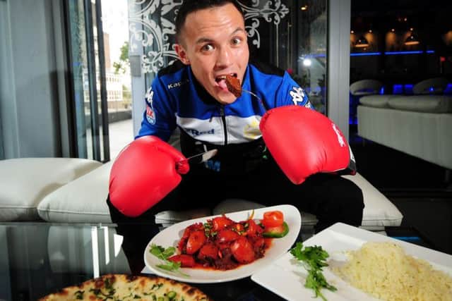 Leeds Warrior gets stuck into curry named after him - Rogan Josh Warrington at the Bengal Brasserie. Photo: Simon Hulme