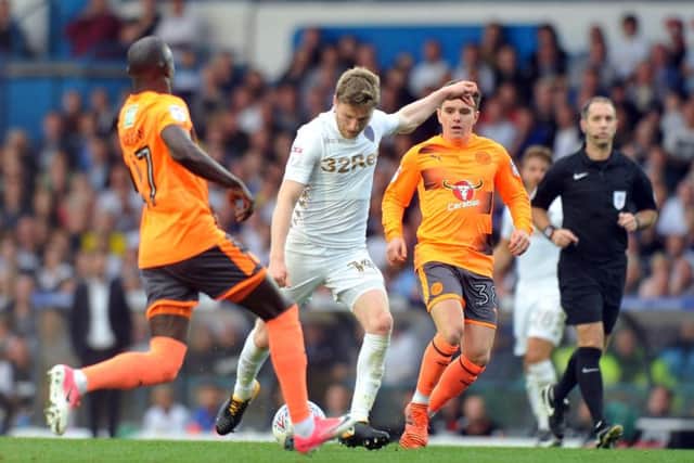 Eunan O'Kane in the thick of the action against Reading.