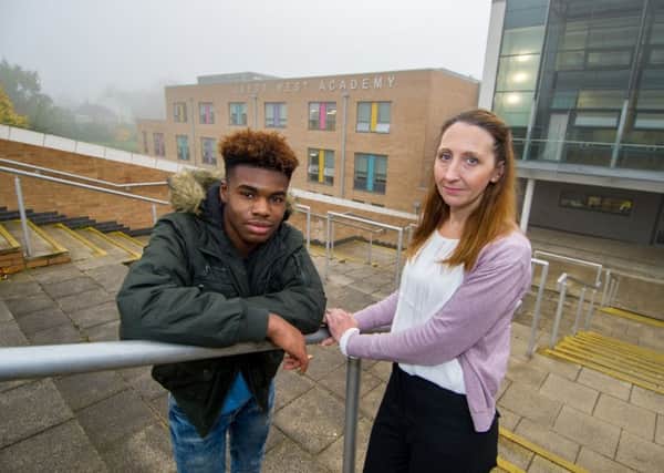 LIFE SAVED: Gerson Costa, 18, with Sarah Stead, a first aider at Leeds West Academy who used CPR when Gerson collapsed playing football. PIC: James Hardisty