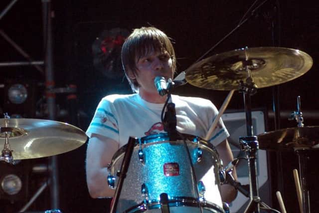 Nick Hodgson on stage with Kaiser Chiefs at Leeds Town Hall in 2005.