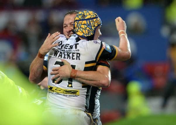 Changing of the guard: Departing Danny McGuire celebrates his second Grand Final try with teen talent Jack Walker. PIC: Bruce Rollinson