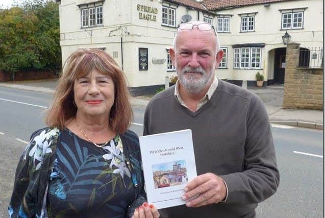 AUTHORS: Dr Avril Jackson and Michael Britton with their Pit Walks Around West Yorkshire book.