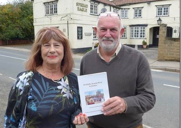 AUTHORS: Dr Avril Jackson and Michael Britton with their Pit Walks Around West Yorkshire book.