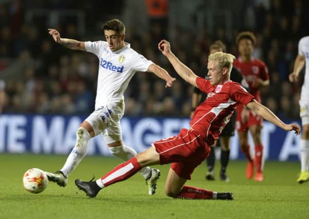 WE'LL MEET AGAIN: Leeds United's Pablo Hernandez battles for the ball with Bristol City's Hordur Magnusson during last season's encounter at Ashton Gate. Picture: Bruce Rollinson