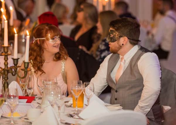 Fundraisers don their masks for the Leeds Baby Bank charity's first anniversary ball.