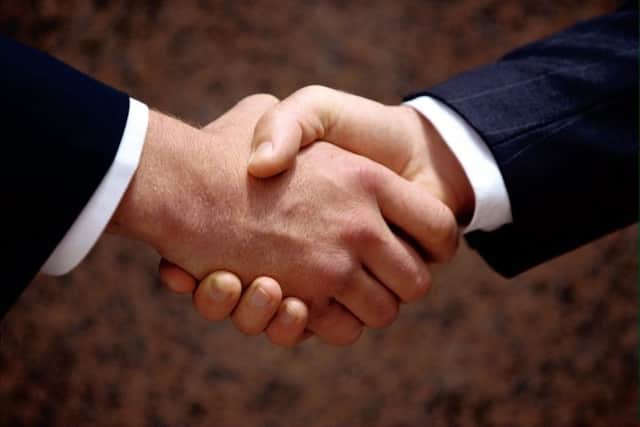 Carillion has signed a deal to offload the bulk of its UK healthcare arm