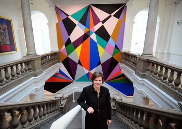 Principal Keeper Sarah Brown with the new commission by German artist Lothar Gotz at Leeds Art Gallery. PIC: Simon Hulme