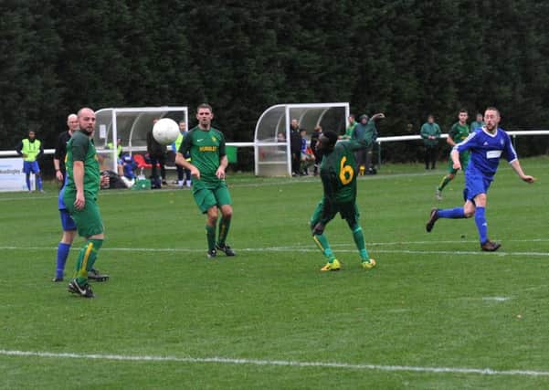 Action from Headingley v Hunslet Club in the Leeds & District FA Senior Challenge Cup. PIC: Steve Riding
