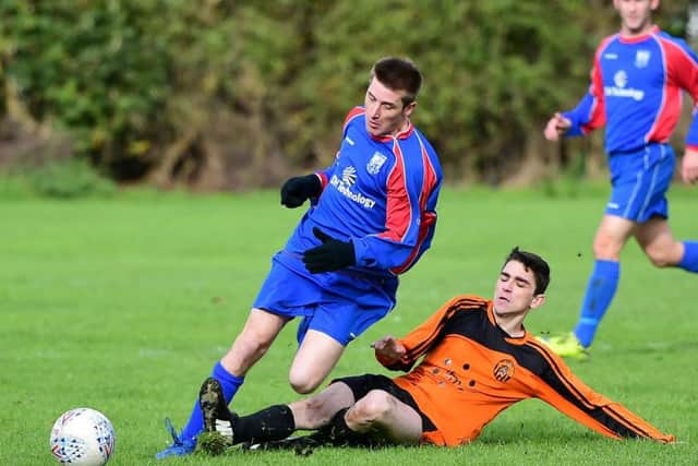 Old Bank's Jonny Mitchell and Josh Auty, of Battyeford, in Heavy Woollen League action. PIC: Paul Butterfield