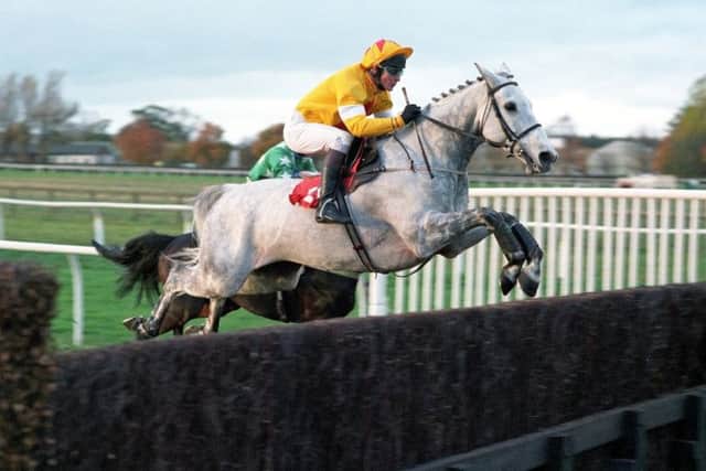 MEMORABLE TRIUMPH: One Man and Richard Dunwoody clear the last to win the 1997 Charlie Hall Chase at Wetherby. 
Picture: Alan Wright/www.officialphotographersuk.com