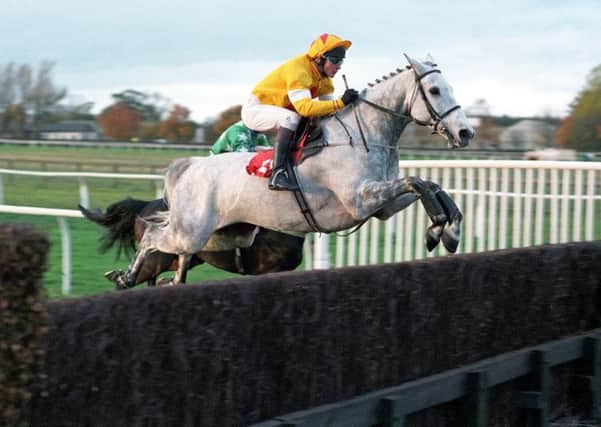MEMORABLE TRIUMPH: One Man and Richard Dunwoody clear the last to win the 1997 Charlie Hall Chase at Wetherby. 
Picture: Alan Wright/www.officialphotographersuk.com