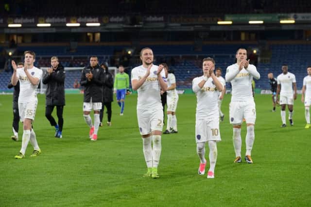 Luke Ayling leads his team-mates towards their fans. PIC: Bruce Rollinson