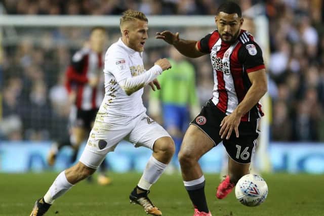 Leeds United's Samuel Saiz and Sheffield United's Cameron Carter-Vickers chase the ball