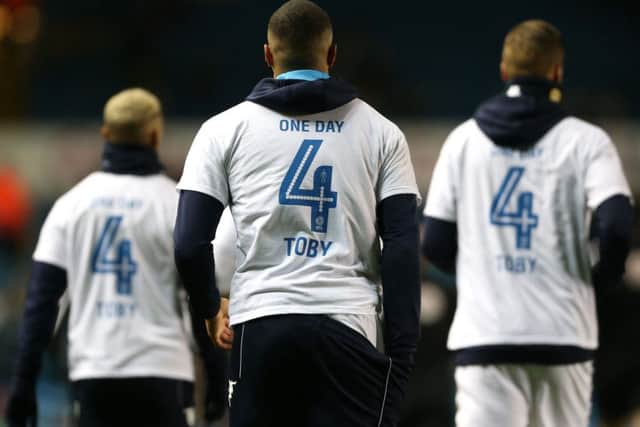 Leeds United players wear shirts in support of Toby Nye.