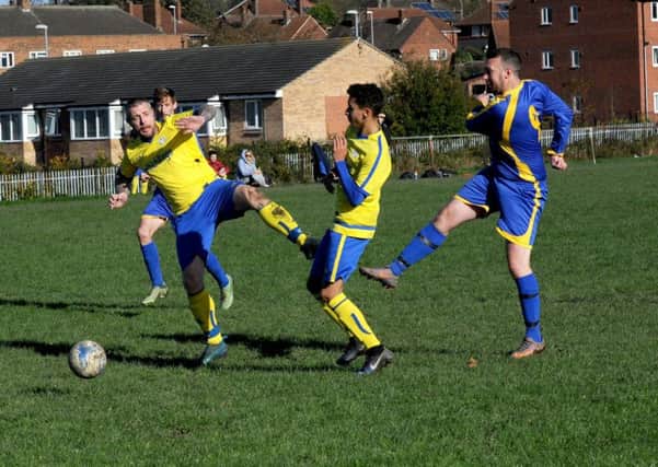Liam Sandford shoots for South Seacroft who stay top of Division 1 following a 1-1 draw with visitors New Armley Blues. PIC: Steve Riding