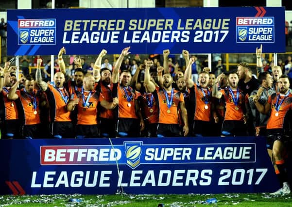 Castleford players celebrate winning the League Leaders Shield. 
Picture: Jonathan Gawthorpe