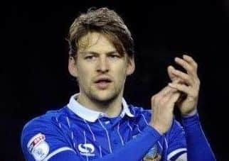 Owls' Glenn Loovens: Aiming to tighten defence.
