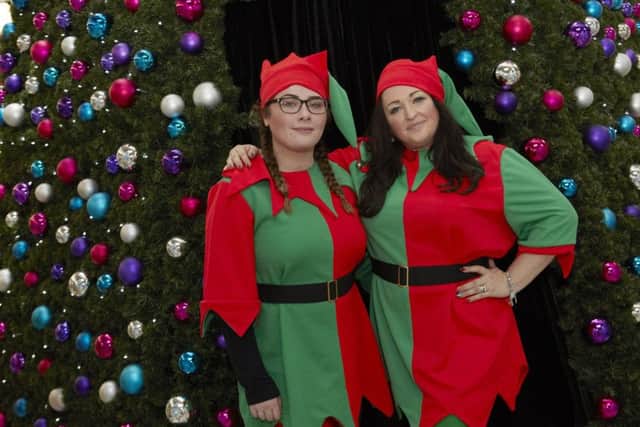 SEASONAL STYLE: Centre staff get into the Christmas spirit.