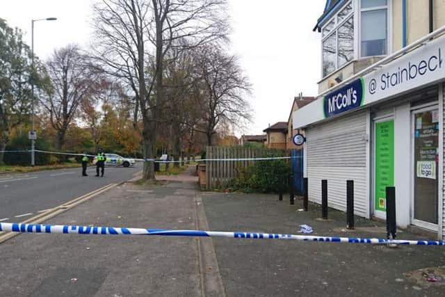 The McColl's shop and police cordon in Stainbeck Road, Meanwood.