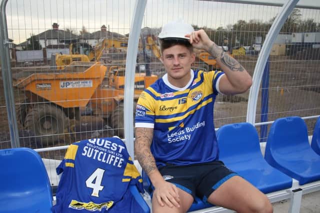 Leeds Rhinos' Liam Sutcliffe helps launch the club's new kit for 2018. Picture courtesy of Leeds Rhinos.