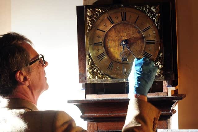 Horology specialist Jonathan Betts looks at the Harrisons Clock, at Nostel Priory. PIC: Simon Hulme
