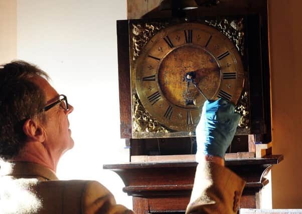 Horology specialist Jonathan Betts looks at the Harrisons Clock, at Nostel Priory. PIC: Simon Hulme