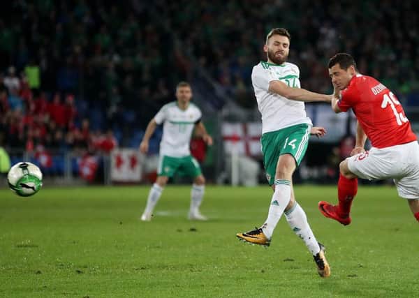 Northern Ireland's Stuart Dallas has a shot on goal during the FIFA World Cup Qualifying second leg match at St Jakob Park, Basel. PIC: Nick Potts/PA Wire