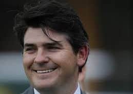 Trainer Hugo Palmer.