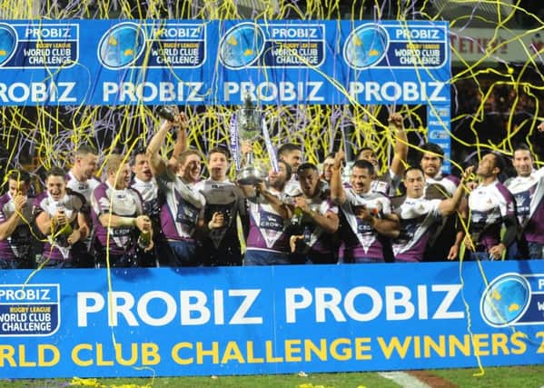 Melbourne Storm celebrate their 2013 World Club Challenge triumph over Leeds Rhinos. PIC: Steve Riding