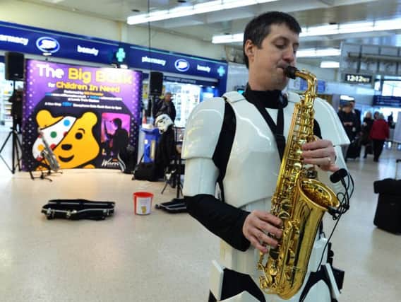 Will Forrester pictured part way through his solo buskathon in aid of Children in Need. Picture: Bruce Rollinson