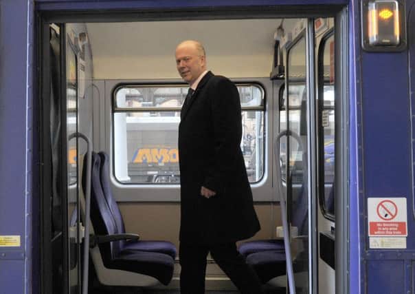 Chris Grayling in York yesterday on his way to Horsforth. He was travelling on a train that will soon be scrapped under Government proposals.