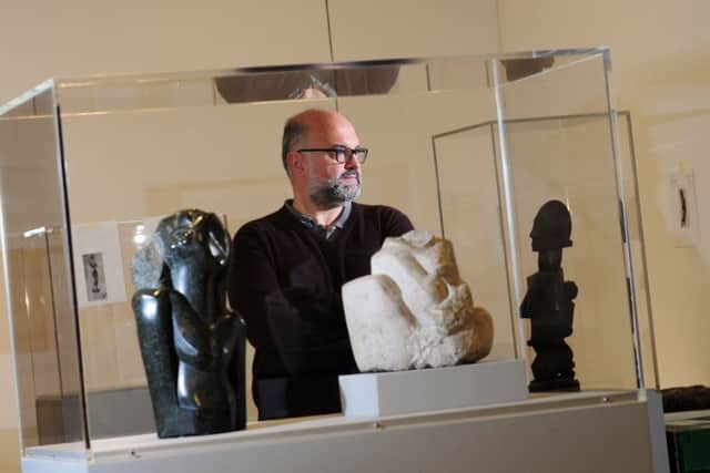 OBJECTS OF DESIRE: Curator Sebastiano Barassi surrounded by works in the Becoming Henry Moore exhibition at the Henry Moore Institute, in Leeds. PIC: Simon Hulme