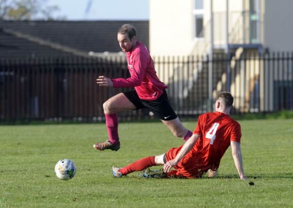 CATCH ME: Beechwood's Barry Edwards breaks through the East Leeds defence.. Picture: Simon Hulme