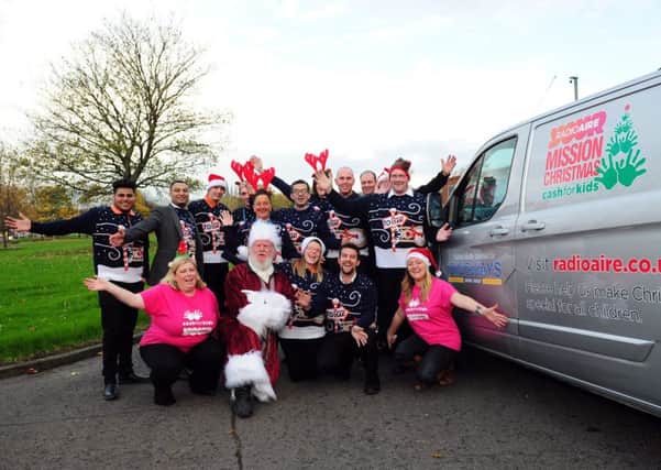 APPEAL: Radio Aire presenters and staff at the launch of Mission Christmas for Kids  earlier this month. PIC: Simon Hulme
